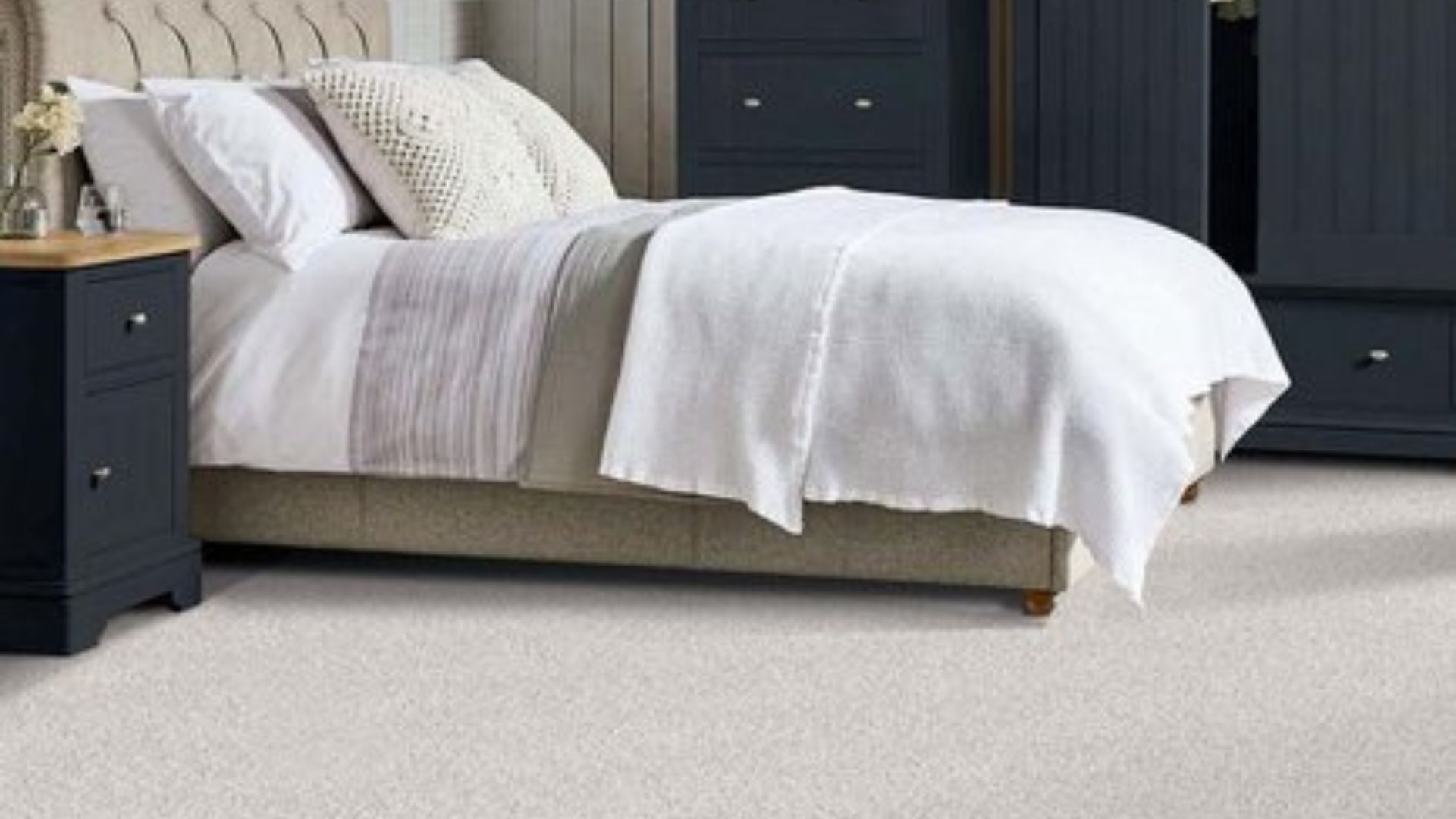 soft off white carpets in a cozy bedroom